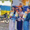 Ket. Foto: Warga saat Menerima Bantuan Beras .
