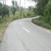 Ket. Foto: Ruas Jalan HR. Koroh, Km. 18, Desa Oben Nyaris Putus di Sebabkan Longsor Akibat Guyuran Hujan.