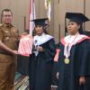 Ket. Foto: Bupati Kupang, Yosef Lede, S. H saat Menghadiri Wisuda di Universitas Persatuan Guru (UPG) 1945 NTT.